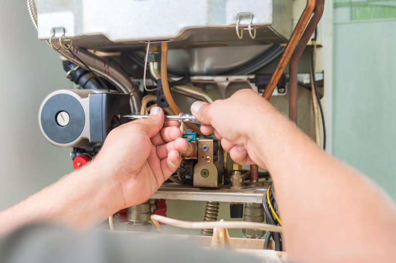 A plumber installing a new gas connection