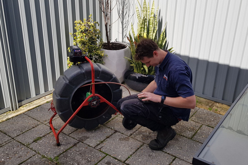 Perth plumber fixing a blocked sewer line