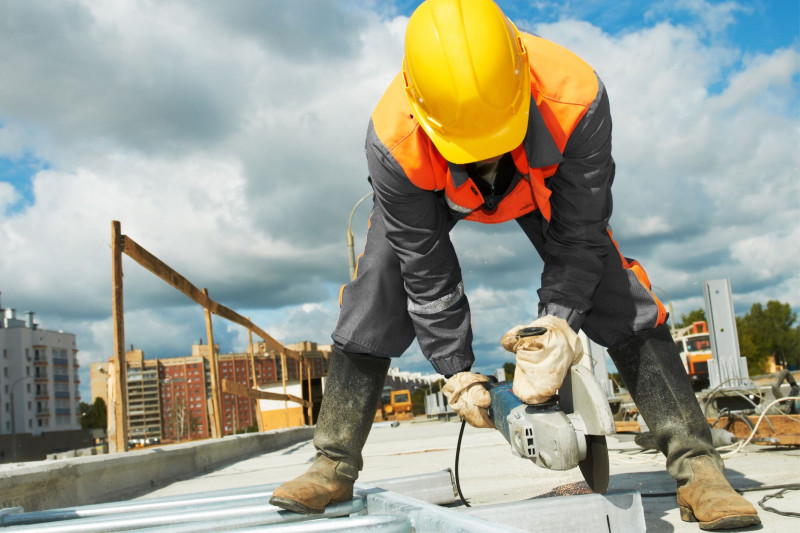 Builder working on a commercial plumbing site